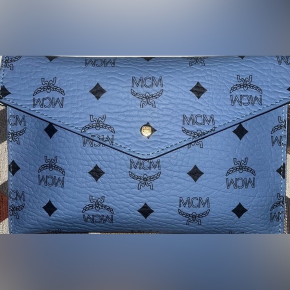 MCM Handbags - MCM Sky Blue Leather Clutch with Black Accents & Unbranded Gold Chain NO BOX